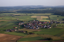 Village - view on the edge of agricultural fields and farmland in Bremelau in the state Baden-Wurttemberg