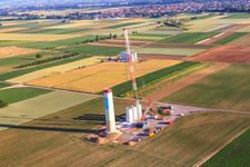 Aerial view of Segments of the mast of a wind turbine during assembly in Offenbach an der Queich in the state Rhineland-Palatinate, Germany