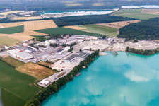 Mixed concrete and building materials factory of Birkenmeier Stein+Design in Gravel mine in the district Niederrimsingen in Breisach am Rhein in the state Baden-Wurttemberg, Germany