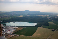 Aerial photograpy of Mixed concrete and building materials factory of Birkenmeier Stein+Design in Gravel mine in the district Niederrimsingen in Breisach am Rhein in the state Baden-Wurttemberg, Germany