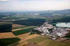 Mixed concrete and building materials factory of Birkenmeier Stein+Design in Gravel mine in the district Niederrimsingen in Breisach am Rhein in the state Baden-Wurttemberg, Germany from above
