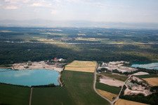 Mixed concrete and building materials factory of Birkenmeier Stein+Design in Gravel mine in the district Niederrimsingen in Breisach am Rhein in the state Baden-Wurttemberg, Germany from the plane