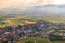 View of the town from the southwest with St. Bartholomew in Heitersheim in the state Baden-Wuerttemberg, Germany