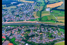 View of the town with railway tracks from the northwest in the district Opperz in Neuhof in the state Hesse, Germany