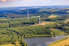 Aerial view of Construction site for wind turbine tower assembly in the district Gunzenau in Freiensteinau in the state Hesse, Germany