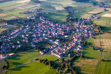Village - view on the edge of agricultural fields and farmland in Wenings in the state Hesse, Germany
