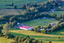 Football field with tent camp in the district Burkhards in Schotten in the state Hesse, Germany
