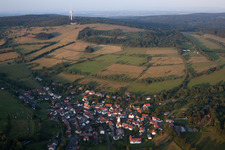 Village - view on the edge of agricultural fields and farmland in Breungeshain in the state Hesse