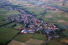 Village - view on the edge of agricultural fields and farmland in Grebenhain in the state Hesse, Germany