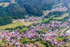 Village - view on the edge of agricultural fields and farmland in Riedenberg in the state Bavaria, Germany