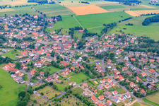 Village view from the east with St. Bonifatius in the district Weyhers in Ebersburg in the state Hesse, Germany