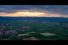 Weather situation with solar radiation from openings in the cloud cover above the Haardt edge in Gönnheim in the state Rhineland-Palatinate, Germany