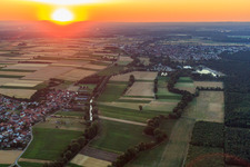 View of the town from the southwest at sunset in Herxheimweyher in the state Rhineland-Palatinate, Germany