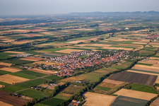 Village - view on the edge of agricultural fields and farmland in Gommersheim in the state Rhineland-Palatinate, Germany