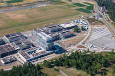 Aerial view of Research building and office complex of Robert Bosch GmbH Zentrum fuer Forschung and Vorausentwicklung at glider airfield in Renningen in the state Baden-Wurttemberg, Germany