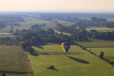 Aerial view of Landing of a hot air balloon D-OTKA in Erlenbach bei Kandel in the state Rhineland-Palatinate, Germany