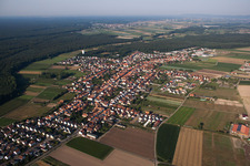 Aerial view of Village - view on the edge of agricultural fields and farmland in Hatzenbuehl in the state Rhineland-Palatinate, Germany