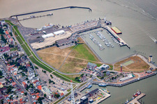 Port facilities on the banks of the Landwehrkanal harbor basin and Alte Liebe lighthouse in Cuxhaven in the state Lower Saxony, Germany
