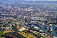Wind turbines on a garbage heap at the Rhine harbor in the district Mühlburg in Karlsruhe in the state Baden-Wuerttemberg, Germany