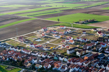 Construction sites for new construction residential area of detached housing estate Am Hoehenweg in Kandel in the state Rhineland-Palatinate from the plane