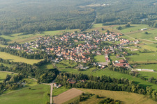Aerial view of Village - view on the edge of agricultural fields and farmland in Forstfeld in Grand Est, France