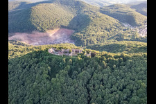 Madenburg Castle ruins from the north above the PfalzGranit quarry in the Kaiserbach Valley in Eschbach in the state Rhineland-Palatinate, Germany